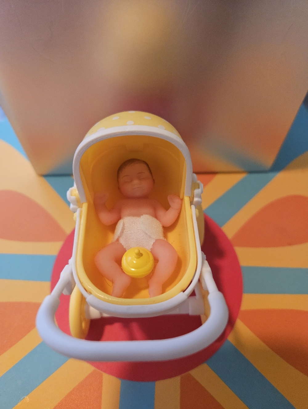 Zuru Mini Baby Doll in Yellow Polka-Dot Stroller - Picture 7 of 7